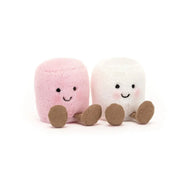 Adorable Jellycat Pink & White Marshmallow plush set, featuring two fluffy marshmallows with rosy cheeks and praline cord boots, linked with a pink satin ribbon. Perfect for cuddling and gifting.
