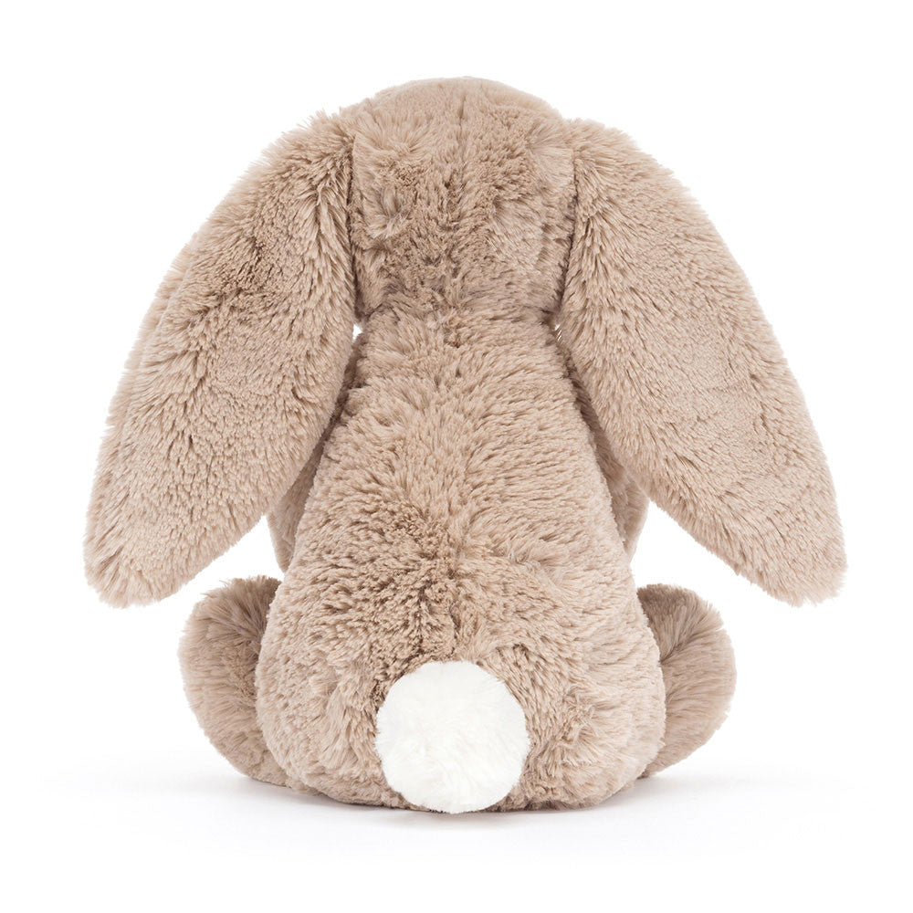 Back view of the Jellycat Birthday Bunny, highlighting its soft, plush fur and adorable white tail.