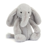 Front view of Jellycat Bashful Luxe Elephant Thuddeus soft toy with long trunk, floppy ears, and plush grey fur.