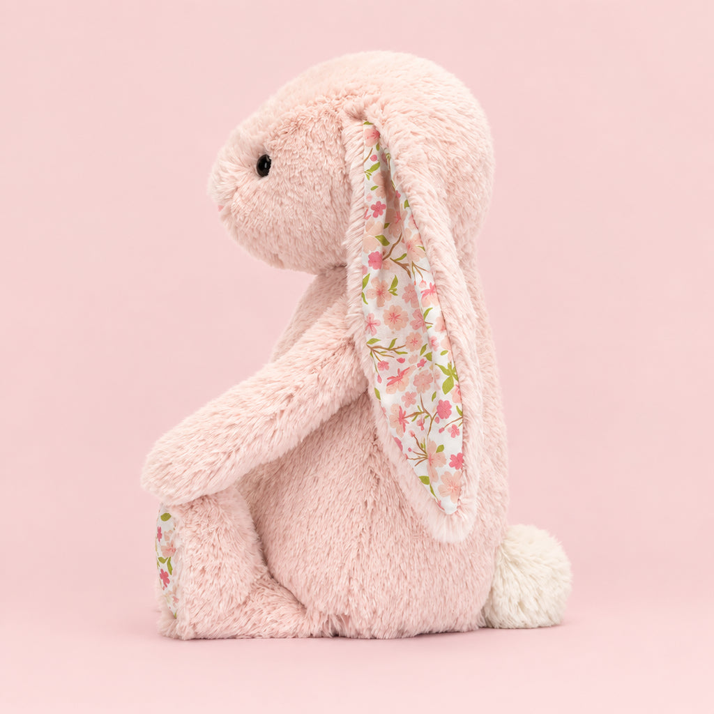 Side view of Jellycat Blossom Blush Bunny ‘Cherry’, showing its adorable profile and petite size.