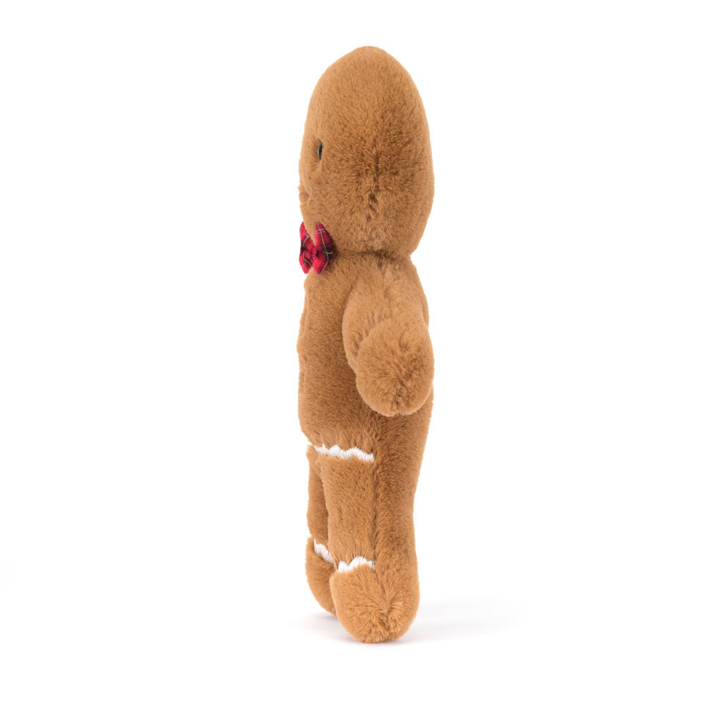 Side view of Jellycat Jolly Gingerbread Fred showing plush texture and bow tie detail.