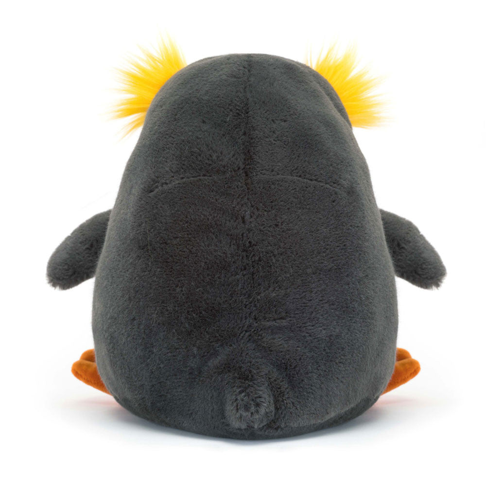 Back view of Maurice Macaroni Penguin highlighting fluffy texture and rounded shape.
