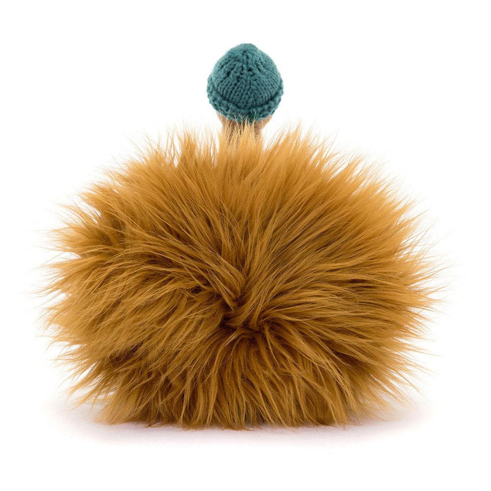 Back view of Theo Turkey showing large fluffy amber tail and knitted hat.