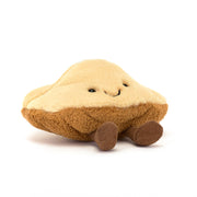 Jellycat Margaux Madeleine shell plush angled view with brown boots