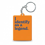 Orange 'I identify as a legend' slogan keyring on white background