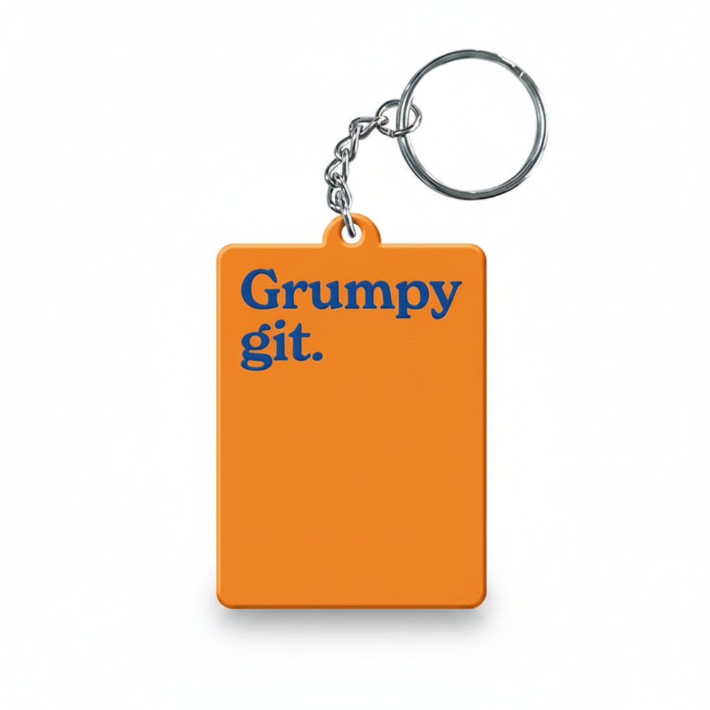 Mint Publishing 'Grumpy Git' orange keyring with blue text								