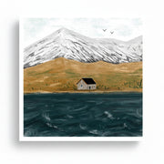 Loch Lomond giclée print featuring a bothy by the water with snowy mountains behind.