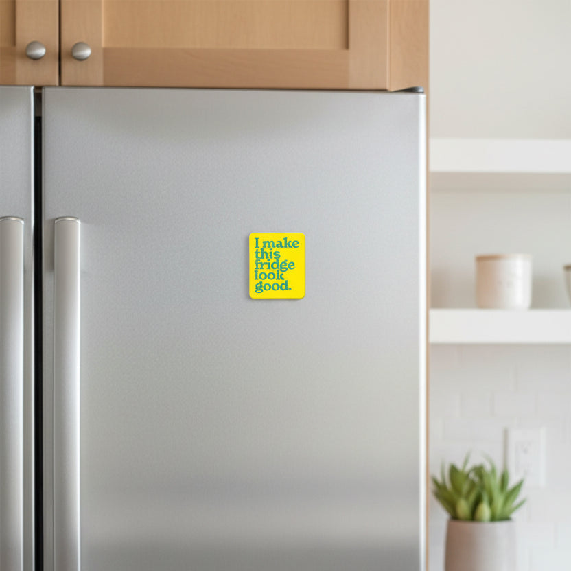 Yellow coaster with teal text 'I make this fridge look good' on a white background