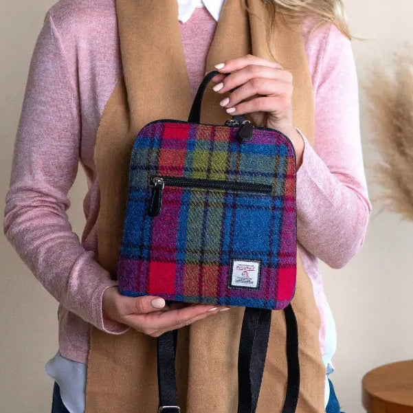 Blue And Pink Check Harris Tweed mini backpack worn by model - lifestyle shot.