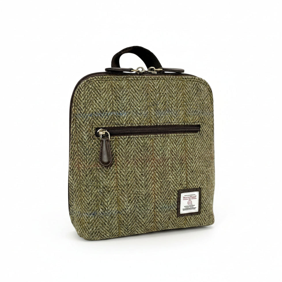 Country Green Harris Tweed mini backpack front angled view on white background.