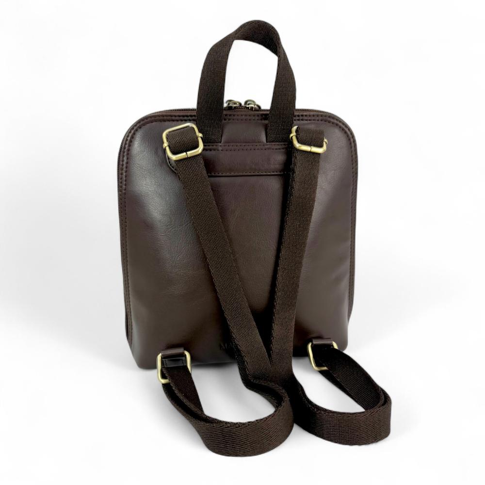 Country Green Harris Tweed mini backpack back view showing brown vegan leather and straps.