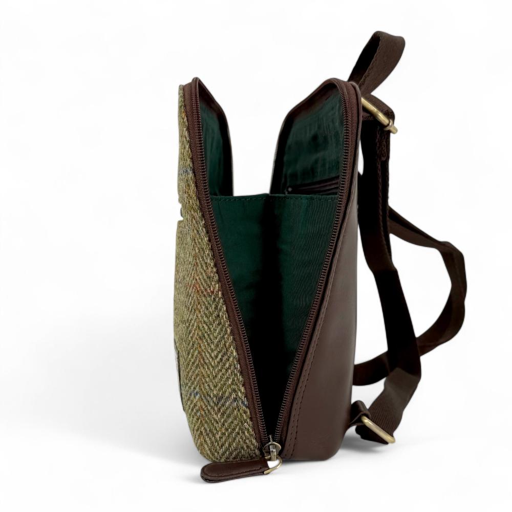 Country Green Harris Tweed mini backpack open side view showing zip-to-base design.