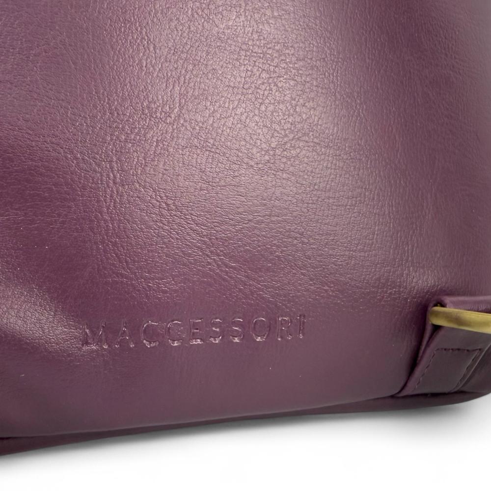 Maccessori embossed branding on plum vegan leather back panel.