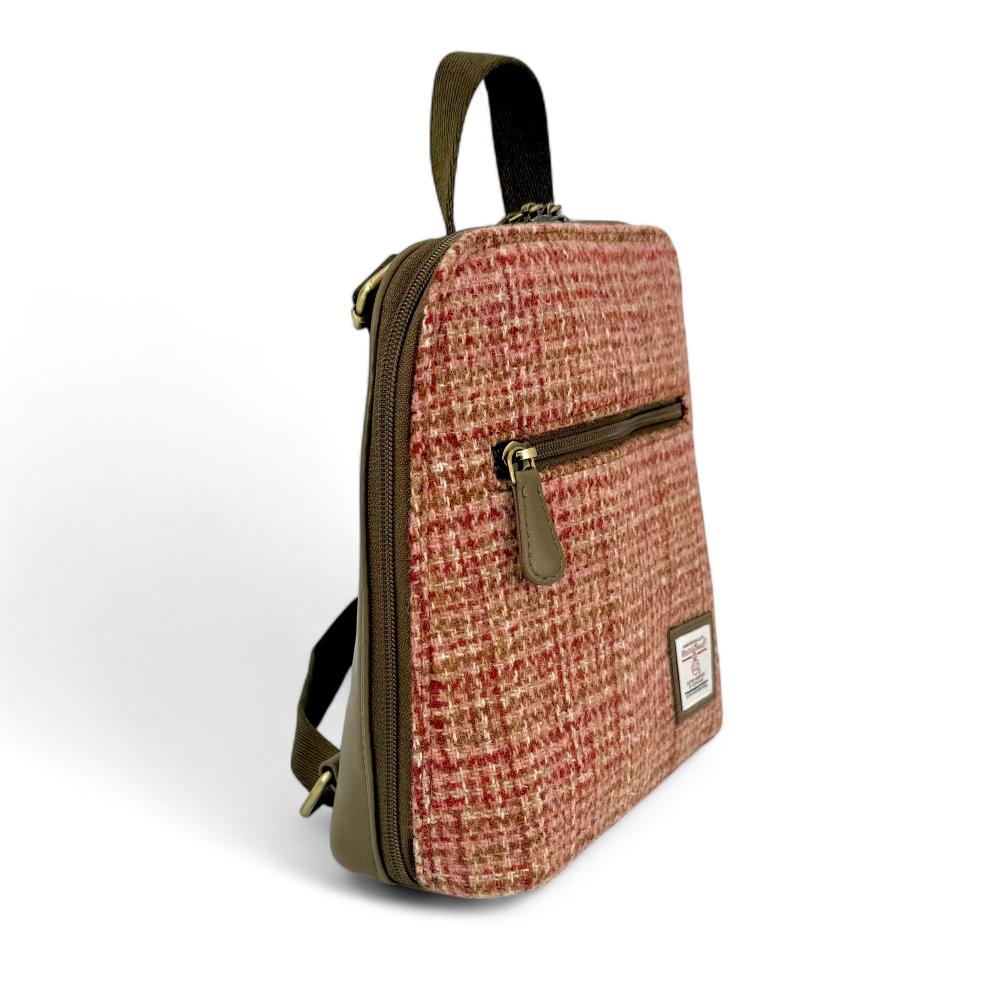Maple Harris Tweed mini backpack side view showing zip pocket on white background.