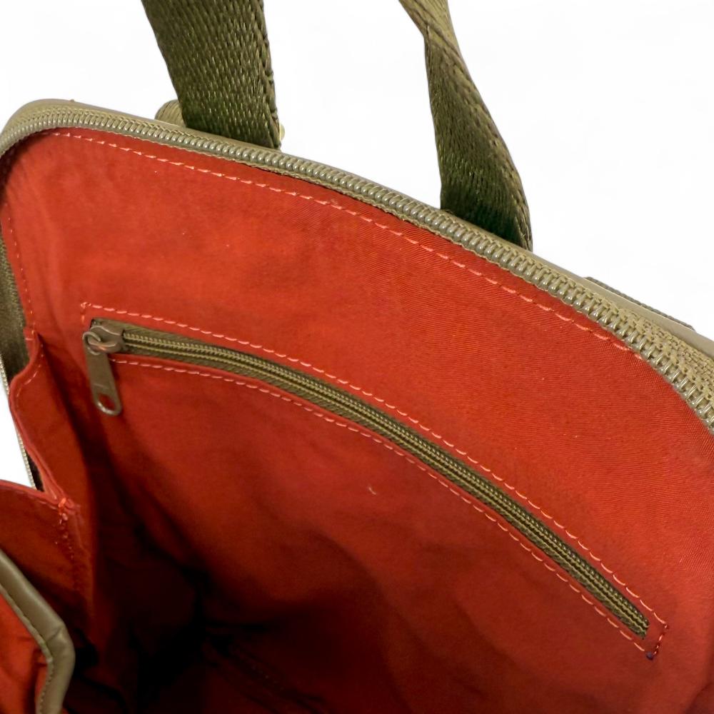 Maccessori embossed branding on olive vegan leather back panel.