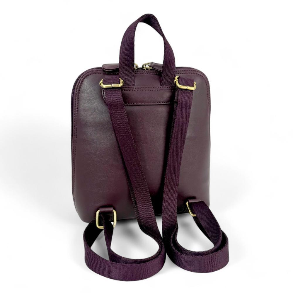 Pastel Pink Harris Tweed mini backpack back view showing purple vegan leather and straps.