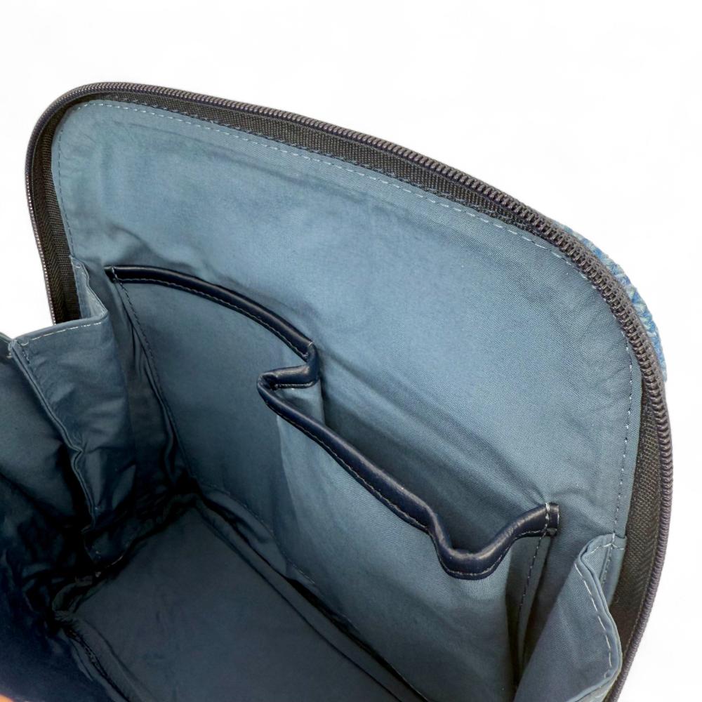 Sky Blue Harris Tweed mini backpack interior showing slip pockets and compartments.