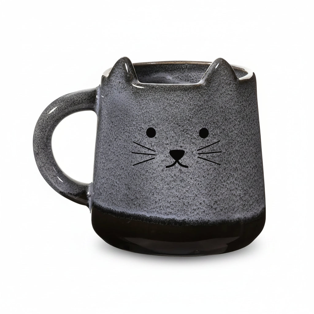 Mojave Cat Mug by Sass & Belle in hand-finished stoneware with cute cat face and 3D ears, brown and beige glaze, 420ml capacity.