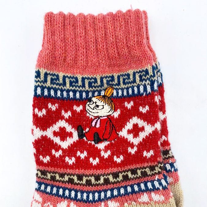 Detailed view of Little My embroidery on red and pink Fair Isle Moomin socks, showing knit texture and playful character design.