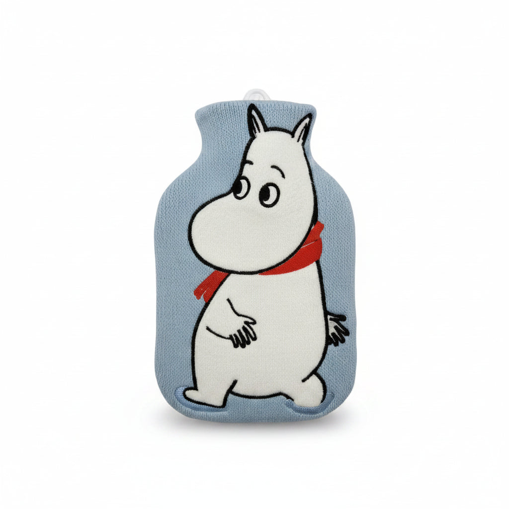 Close-up of Moomin applique design on baby blue knit mini hot water bottle.