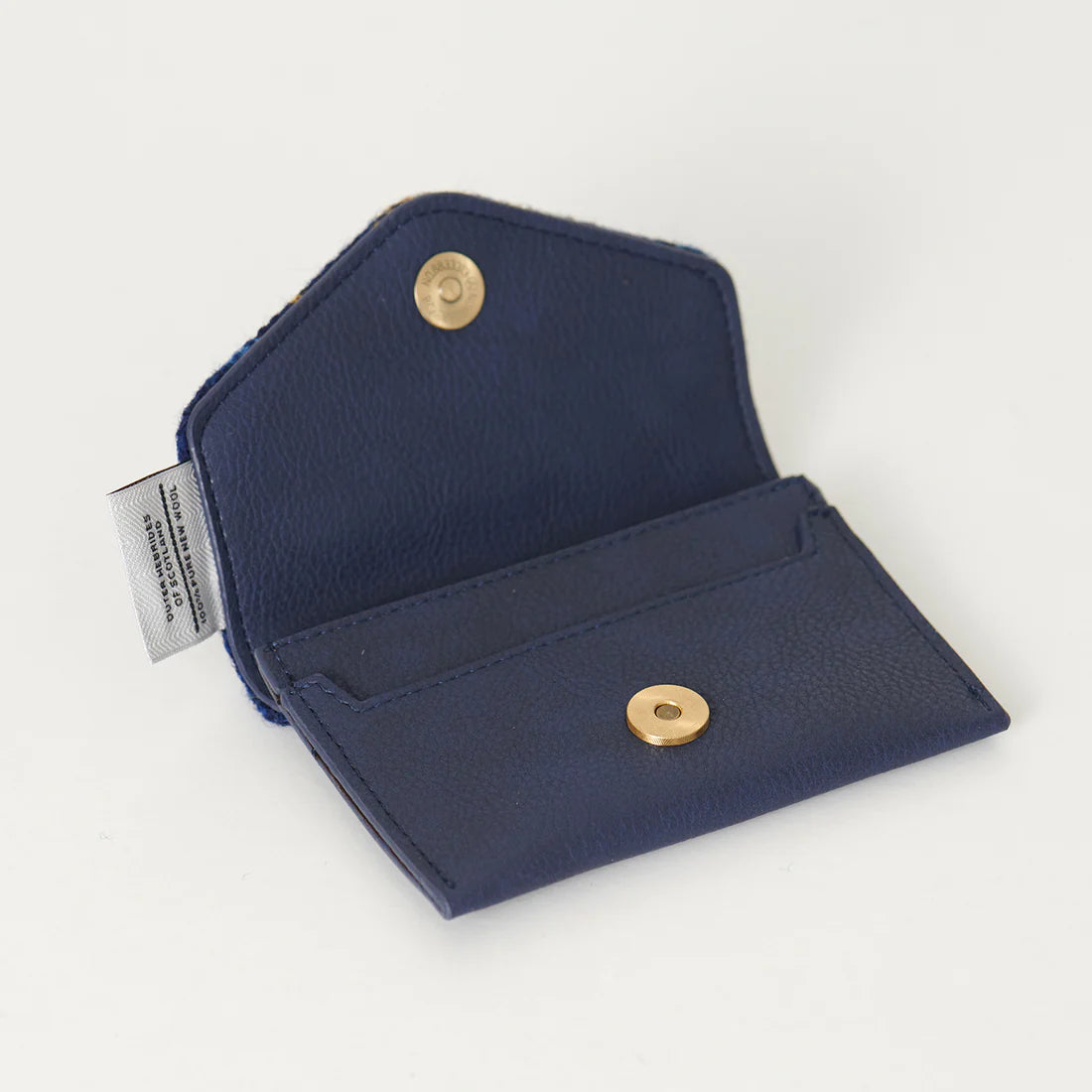Inside the navy tartan harris tweed card holder. 
