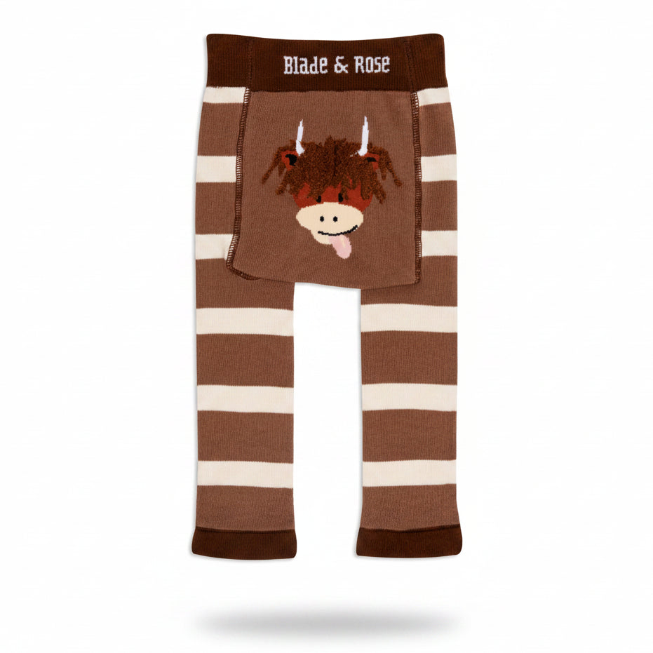 Flat lay of Neutral Highland Cow Leggings showing stretchy waistband and adorable cow print.