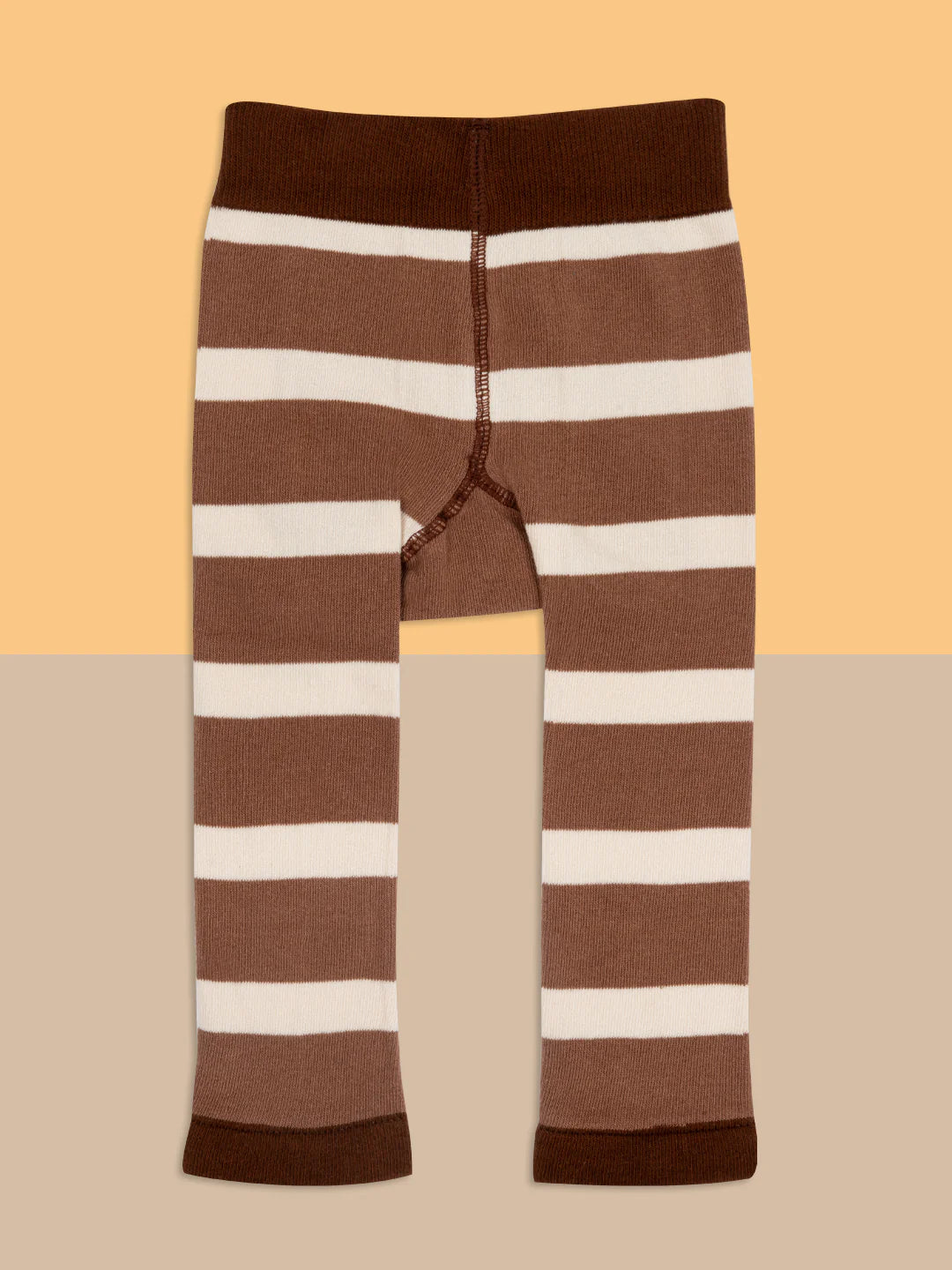Neutral Highland Cow Leggings displayed flat, highlighting soft, stretchy cotton fabric.