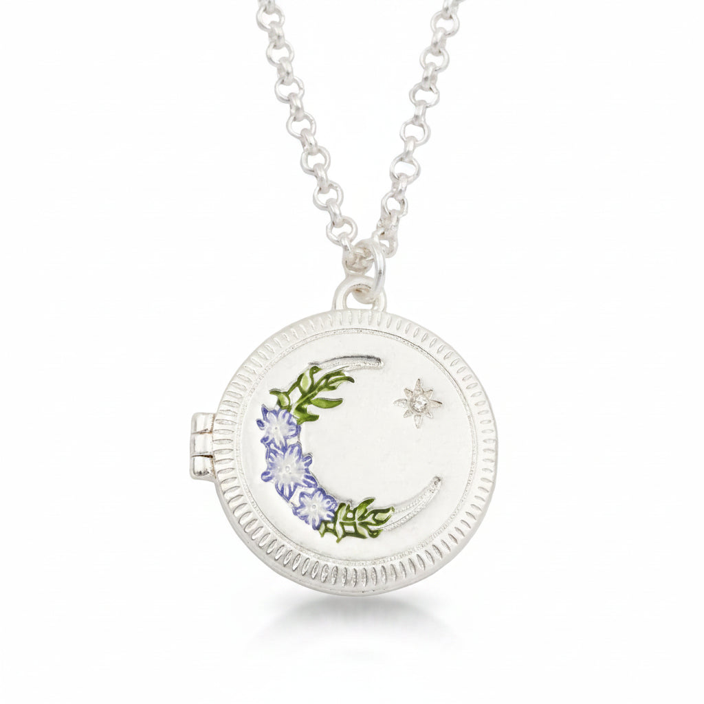 Nightshade Moon Round Silver Locket Necklace with enamel crescent and star detail.