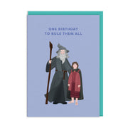 Periwinkle birthday card illustrated with a bearded wizard and a small hobbit