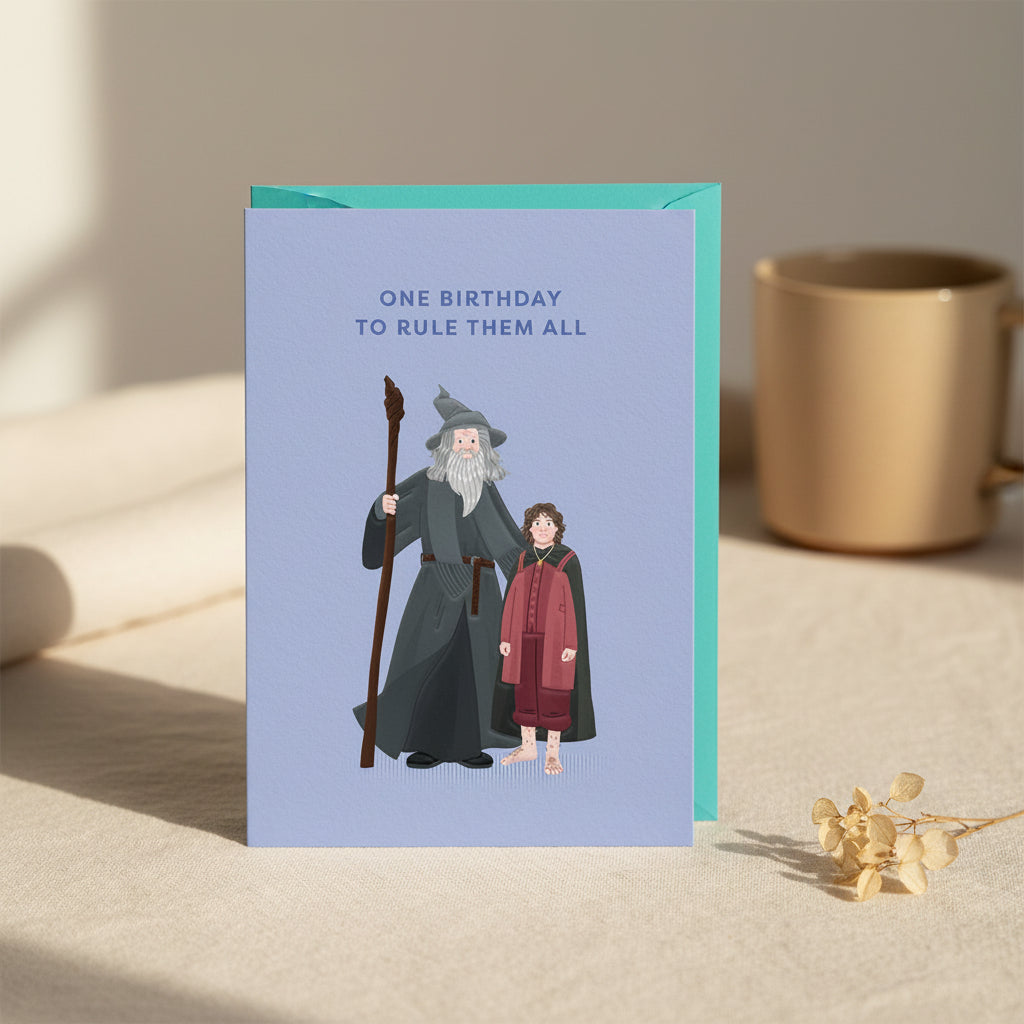 Greeting card with illustration of a wizard and a child on a blue background