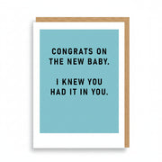 Powder blue new baby card with bold black capitals and no illustration