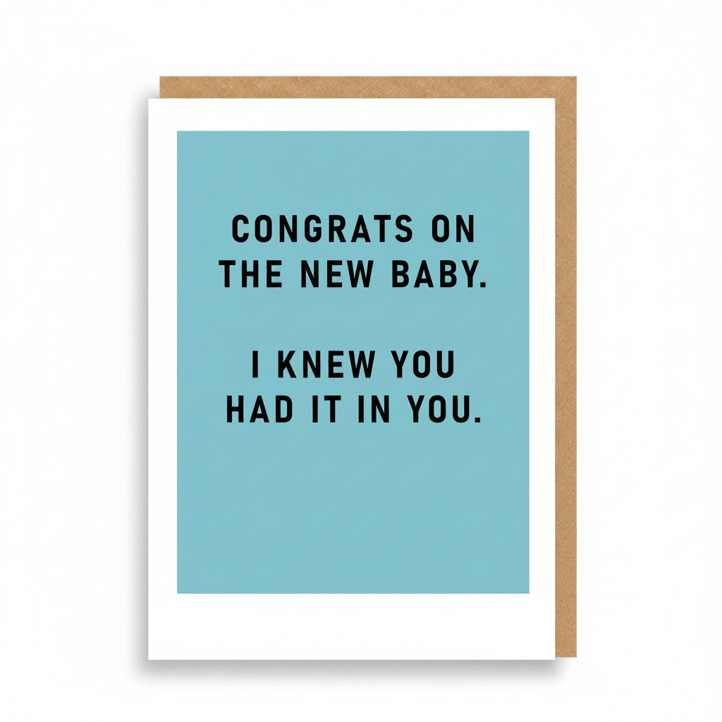 Powder blue new baby card with bold black capitals and no illustration