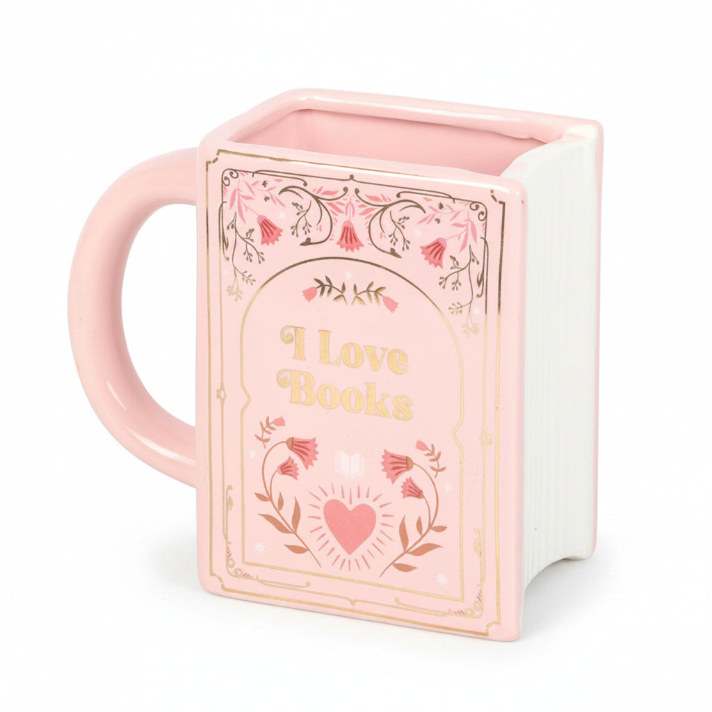 Pink book shaped ceramic mug with gold lettering “I Love Books” on white background.