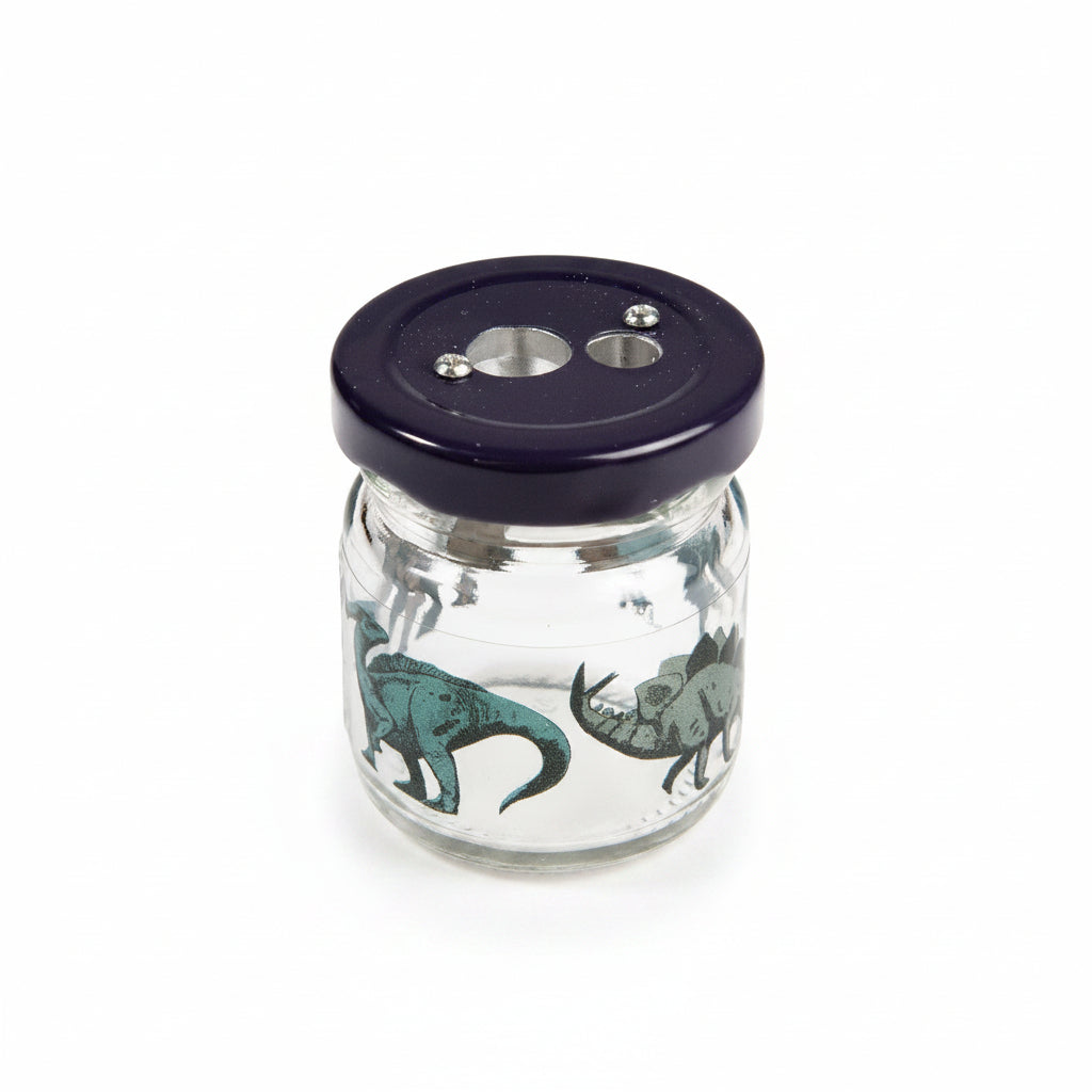 Dinosaur glass jar pencil sharpener angled view on white background