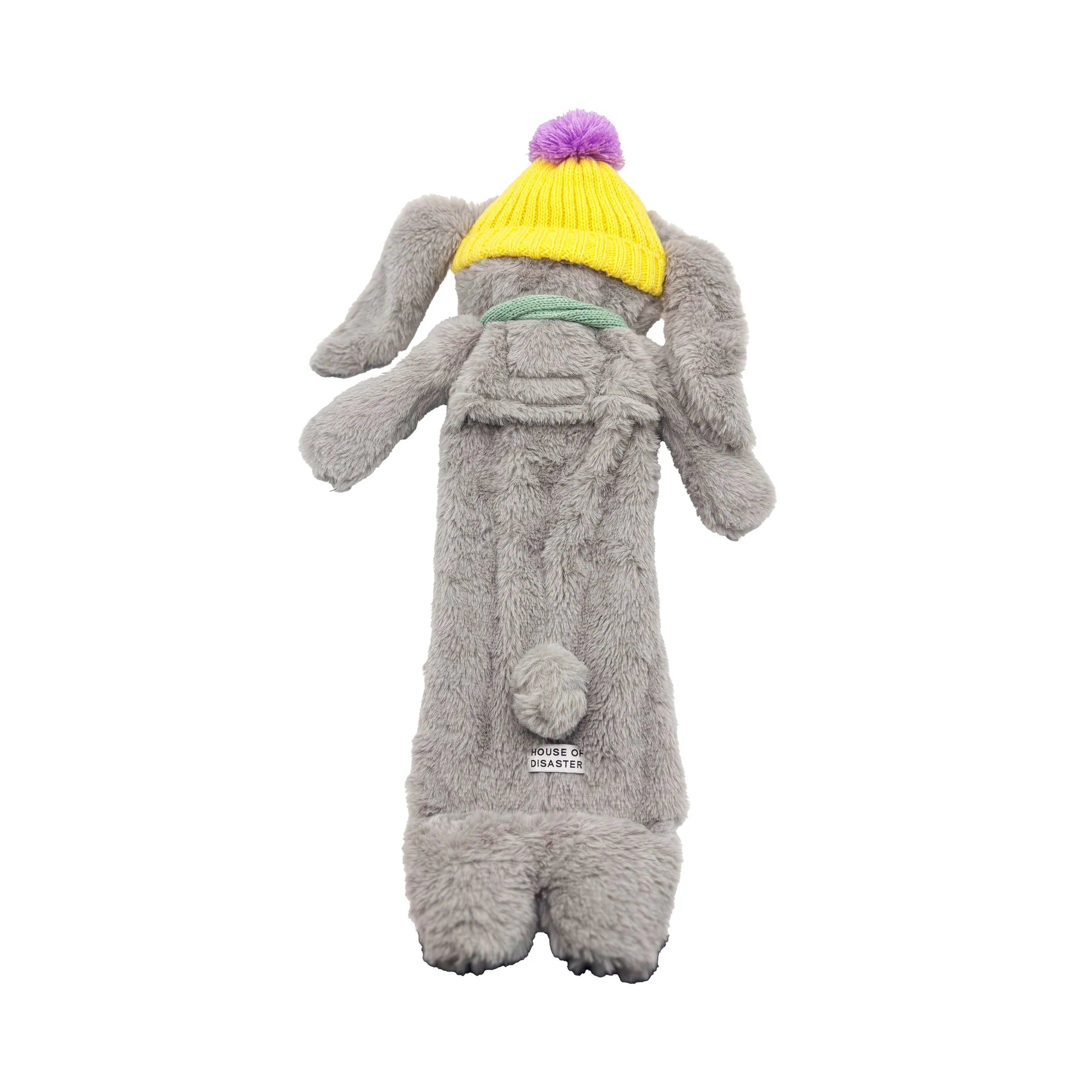 Rear studio view showing hat, scarf, and fluffy detailing.