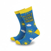 Men’s bamboo socks with bright yellow sun and cloud pattern on a blue background and bold text reading “I’m a Ray of Fucking Sunshine” – UK 8-11 size.