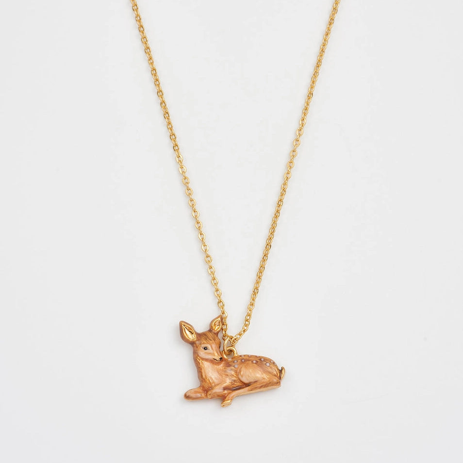 Resting Fawn Gold Chain Necklace pendant close-up on white background.