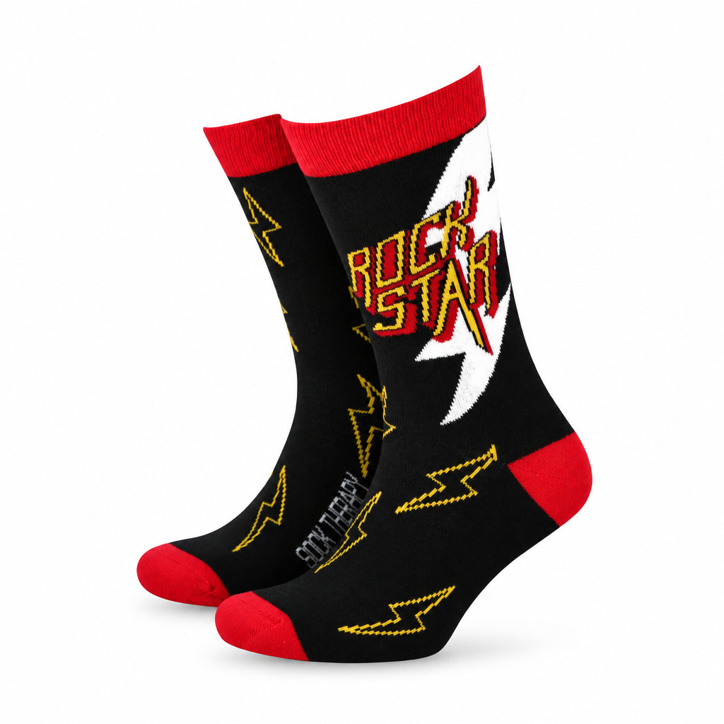 Rock Star men’s bamboo socks with black base, red heels and cuffs, white lightning bolt and bold yellow “Rock Star” text – sustainable bamboo socks by Sock Therapy.