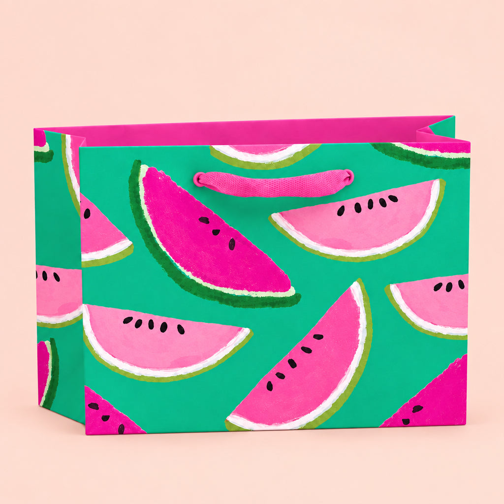 A rectangular gift box with a bright pink and green watermelon slice pattern, shown on a clean white background.