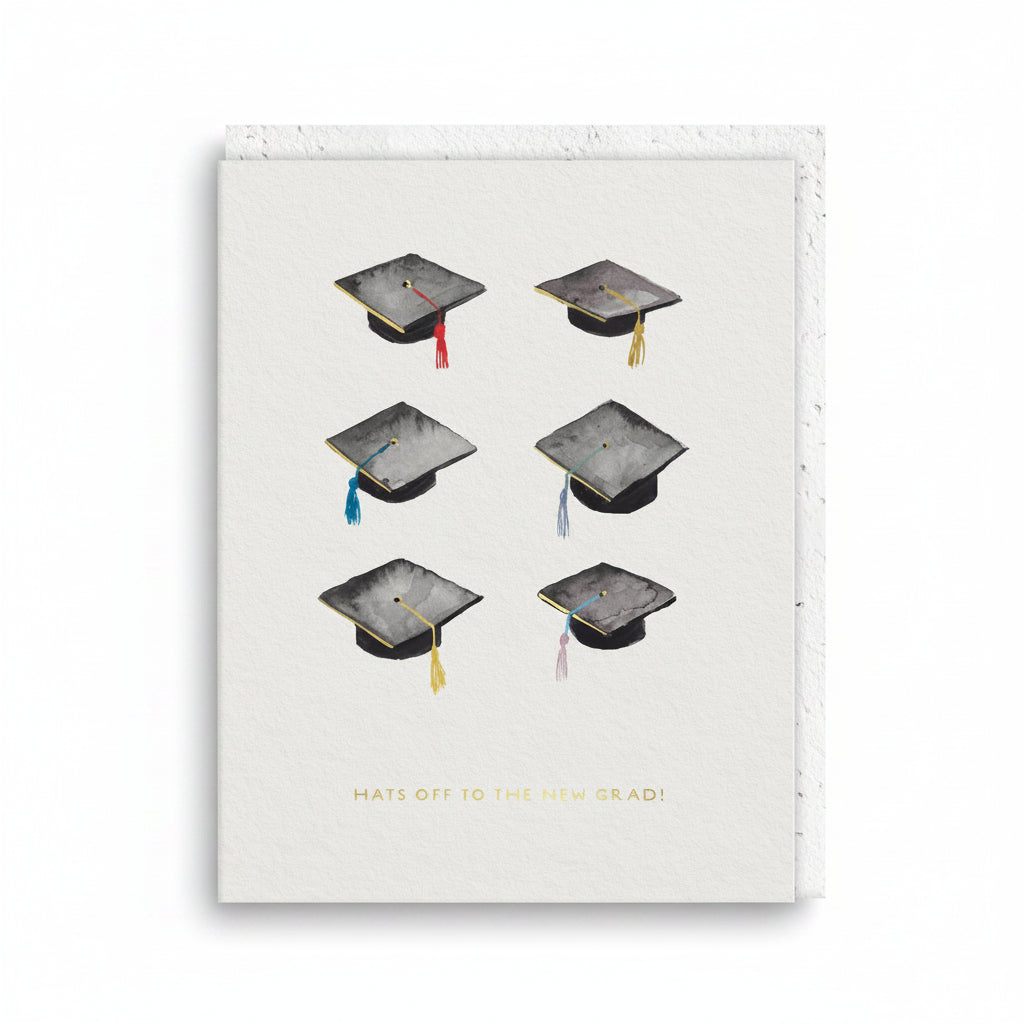 Cream graduation card with six watercolour mortar boards and tassels