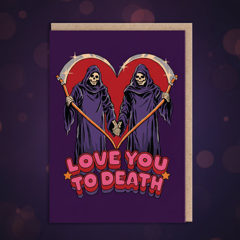 Greeting card with two skeletons in purple robes holding scythes forming a heart with 'Love You to Death' text on a purple background.