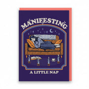 Purple card showing a woman asleep on a sofa surrounded by lit candles