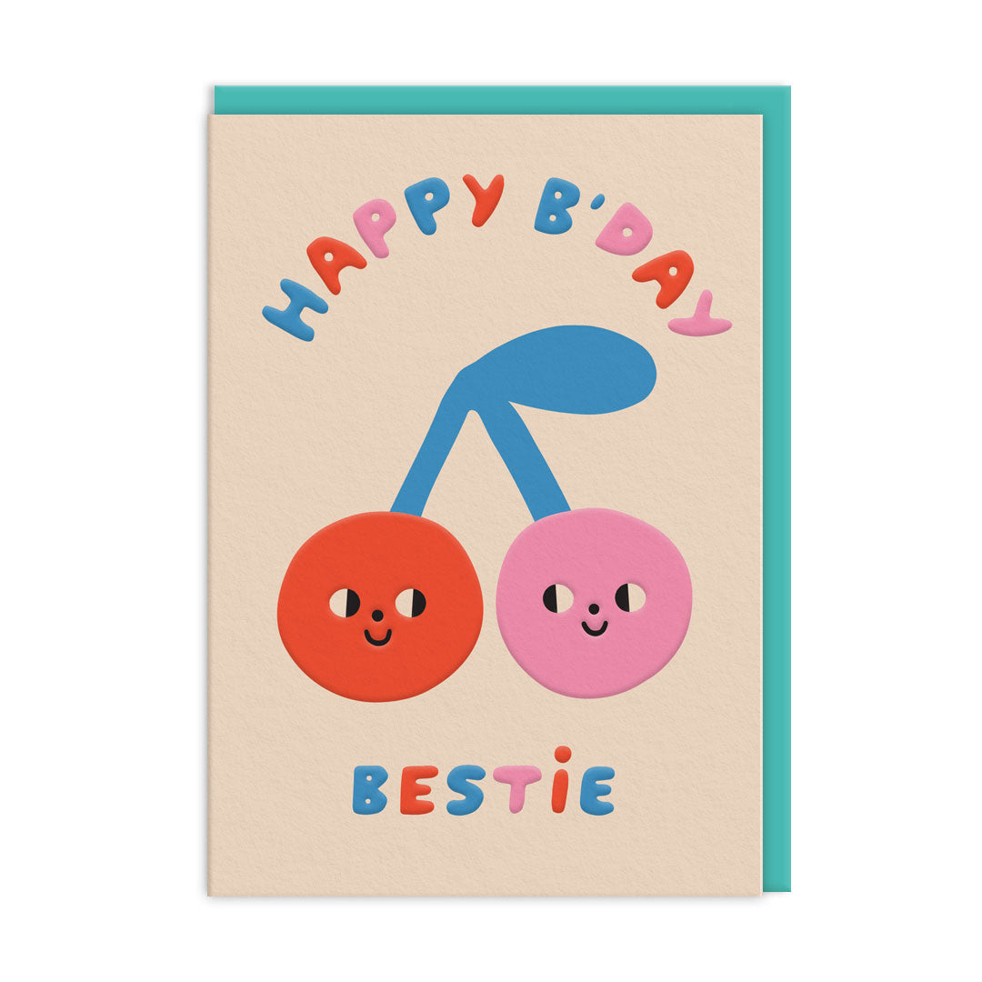 Blush card with two smiling cherries above the word bestie in bubble letters