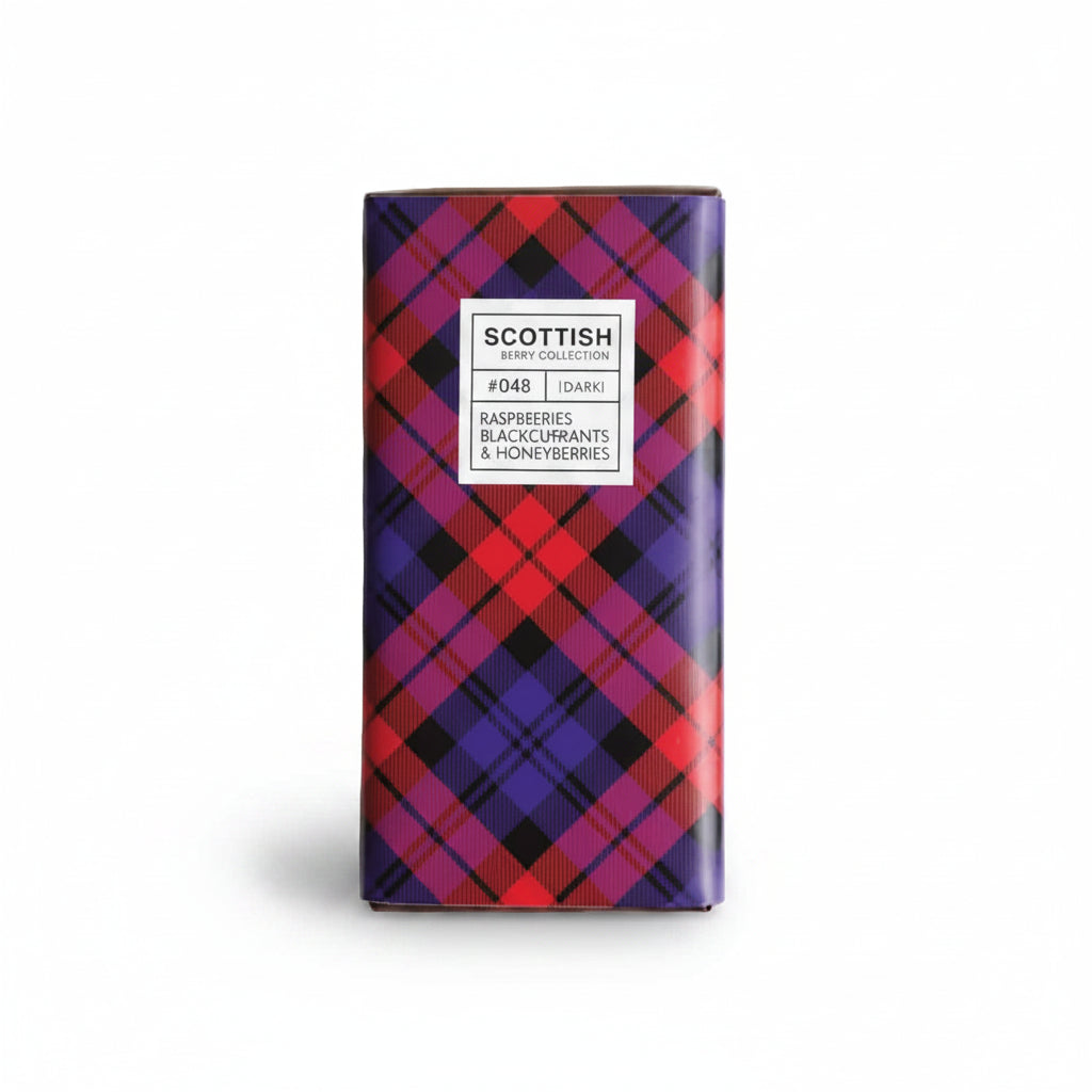 Chocolate bar with plaid packaging and berries on a white background