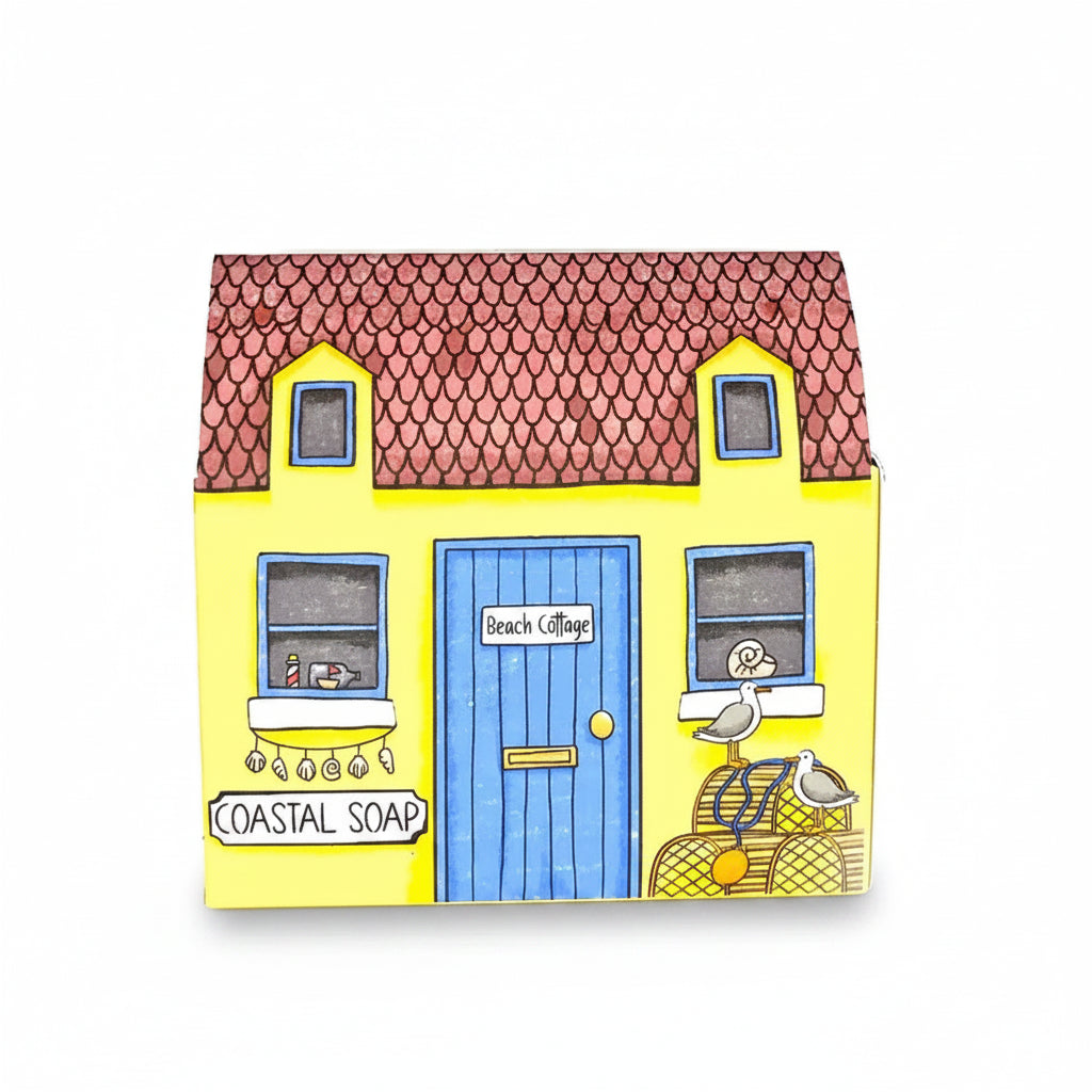 Seaside house soap front view showing illustrated cottage on white background
