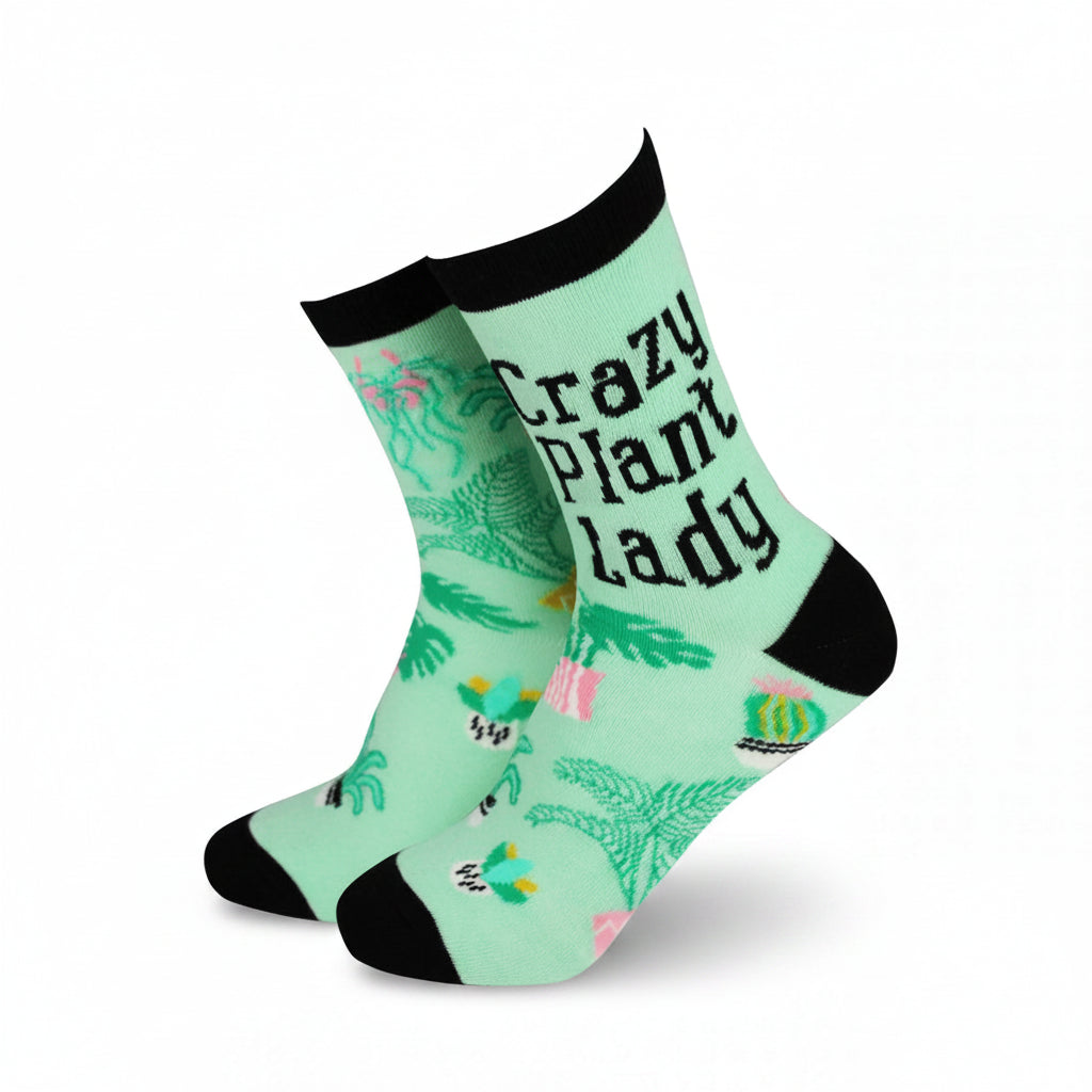 Mint green bamboo socks with “Crazy Plant Lady” text and colourful potted plant designs, shown in angled side-by-side display.