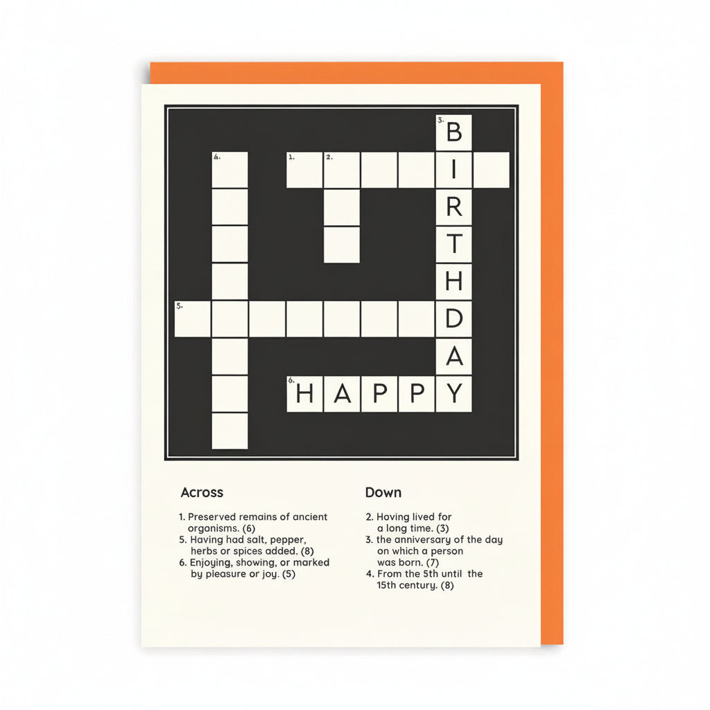 Cream birthday card printed with a black crossword grid and printed clues