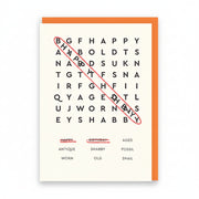 Cream birthday card with a word search grid and two words circled in red