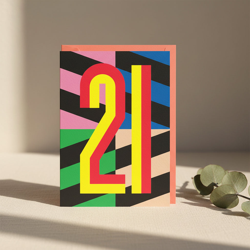 Colorful geometric patterned notebook with the number '21' on a white background