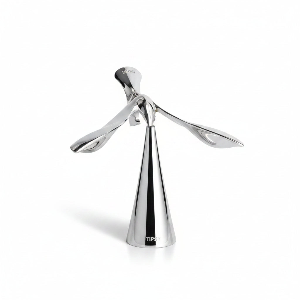 Umbra Tipsy opener showing chrome figurine self-righting mechanism detail